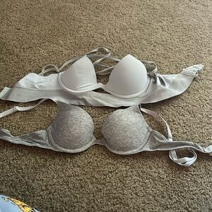 Two bras from PINK first one is a xs the other I a 32A